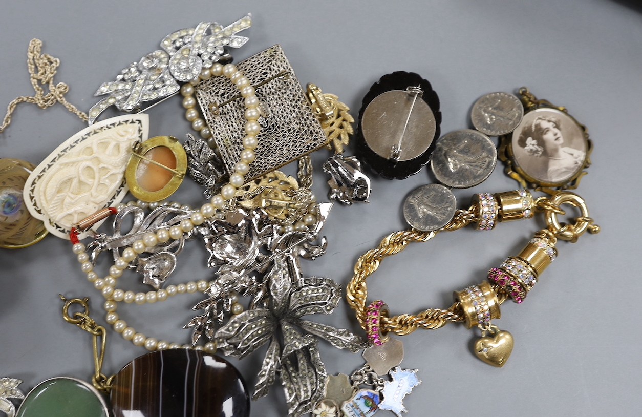 A silver charm bracelet, white metal charm bracelet and a small group of assorted costume jewellery.